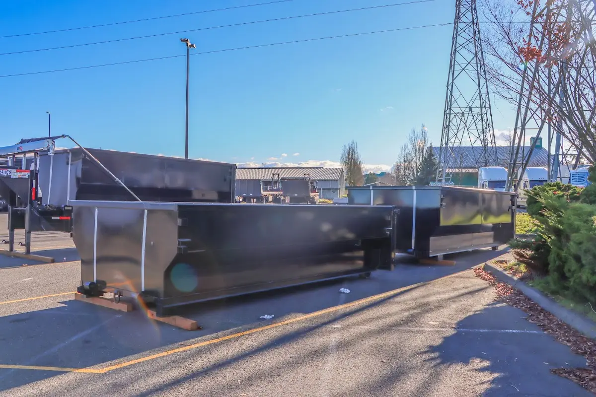 Roll-off dumpster ready for waste disposal at job site for Concrete Dumpster Rental in Haslet